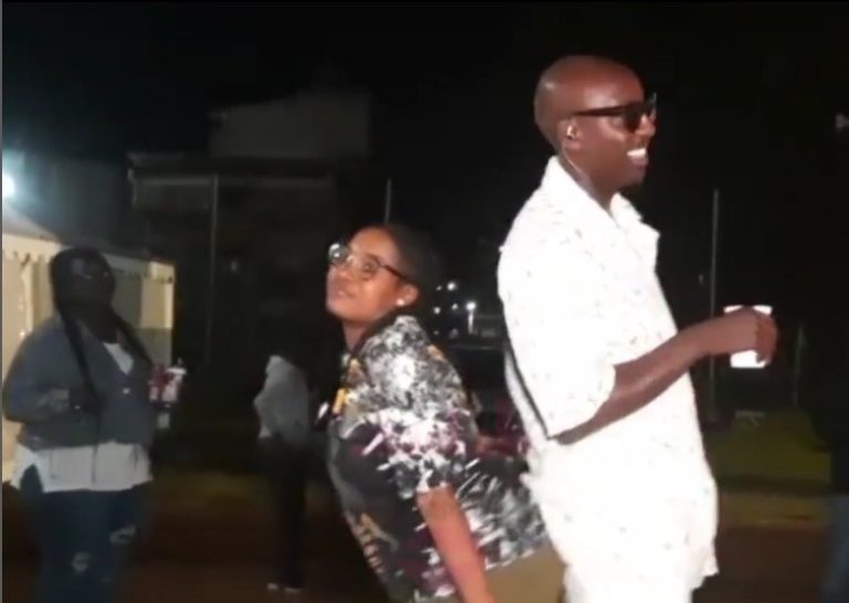 Drama as famous singer’s wife chases away fan who climbed stage to grind him [Video]